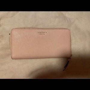 Pink Kate Spade accordion wallet